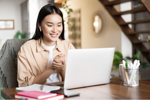 /asian-girl-studies-home-using-laptop-computer-young-woman-attends-online-classes-webinar-video.jpg